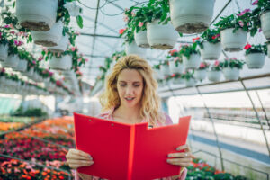 women reading Farmers Almanac